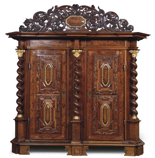 A SWISS PARCEL-GILT, PEWTER-INLAID WALNUT, STAINED FIELD MAPLE AND FRUITWOOD CUPBOARD 'HALLENSCHRANK'