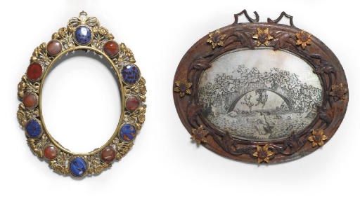 AN OVAL ENGRAVED MOTHER-OF-PEARL PLAQUE