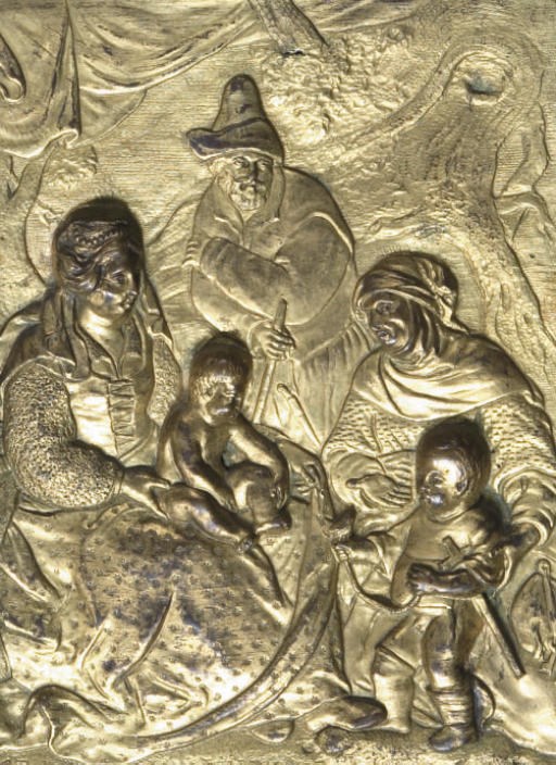 A GILT-BRONZE RELIEF OF THE HOLY FAMILY
