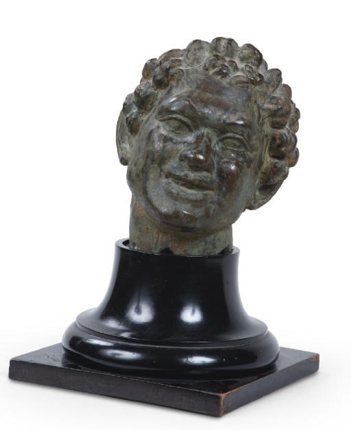 A BRONZE HEAD OF A FAUN
