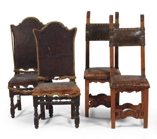 A PAIR OF ALPINE STAINED PINE HIGH-BACK CHAIRS