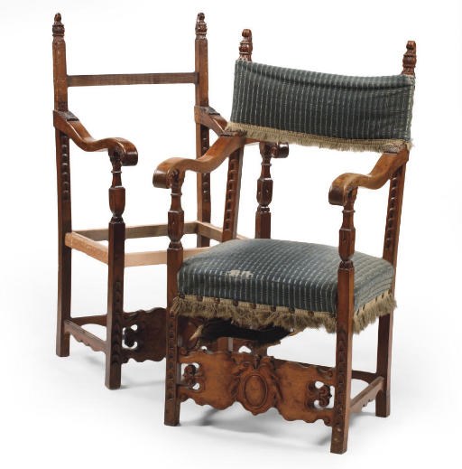 A MATCHED PAIR OF STAINED WALNUT ARMCHAIRS