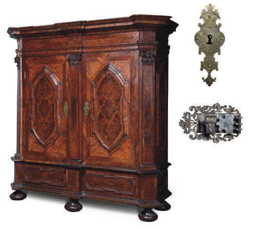 A GERMAN WALNUT, BURR-ELM, TULIPWOOD AND AMARANTH CUPBOARD 'HALLENSCHRANK'