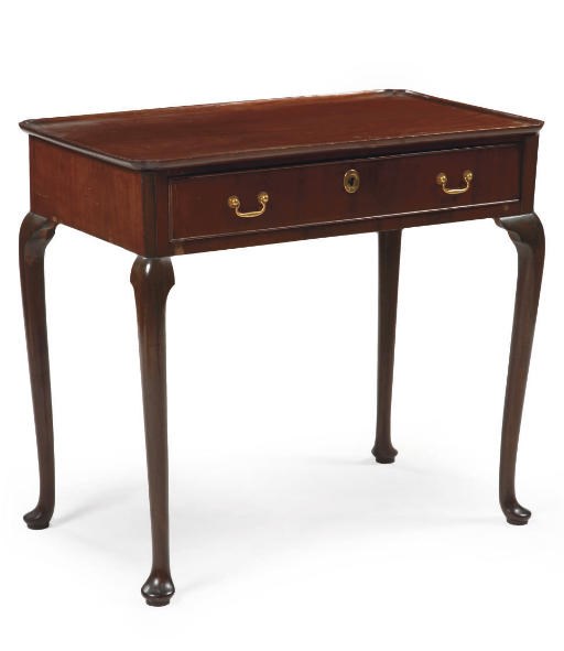 A NORTH GERMAN ORMOLU-MOUNTED MAHOGANY TEA TABLE