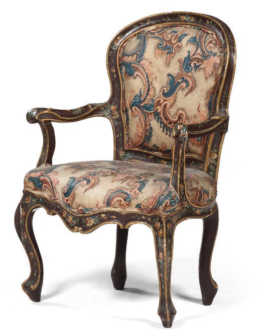 AN ITALIAN POLYCHROME DECORATED ARMCHAIR