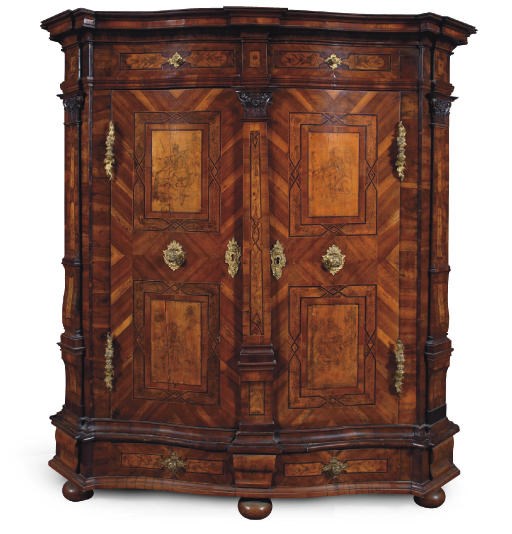AN AUSTRIAN ORMOLU-MOUNTED WALNUT, FRUITWOOD, BURR-BIRCH AND PEN-ENGRAVED CUPBOARD