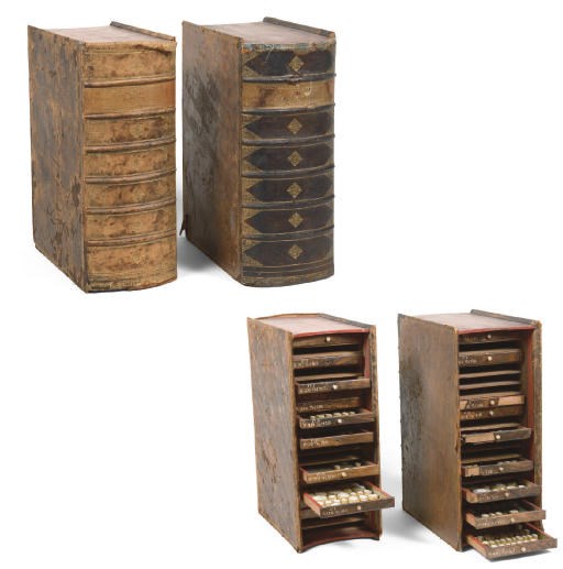 A PAIR OF AUSTRIAN LEATHER-BOUND BOOK-SHAPED COLLECTOR'S CABINETS CONTAINING A COLLECTION OF PLASTER INTAGLIOS