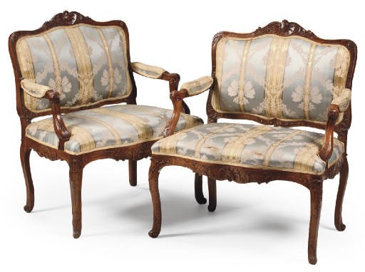 A PAIR OF AUSTRIAN CARVED BEECHWOOD ARMCHAIRS