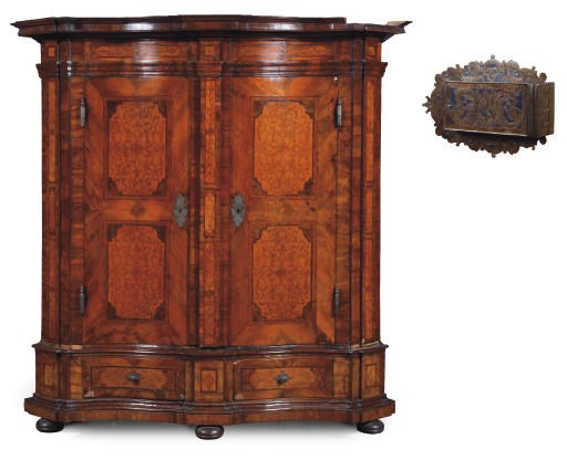 AN AUSTRIAN WALNUT, FRUITWOOD AND PEN-ENGRAVED CUPBOARD