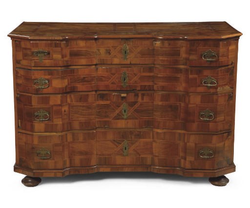 AN AUSTRIAN BRASS-MOUNTED WALNUT COMMODE