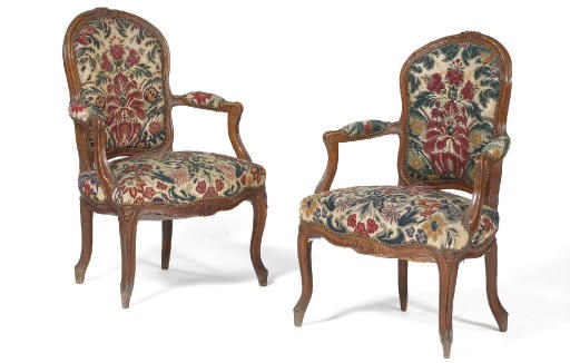 A PAIR OF LOUIS XV CARVED BEECHWOOD ARMCHAIRS