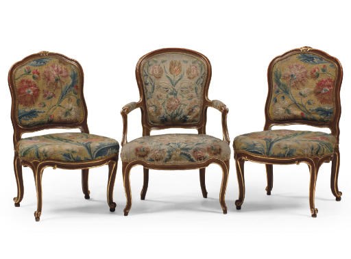 A PAIR OF AUSTRIAN PARCEL-GILT AND GRAINED WOOD SIDE CHAIRS