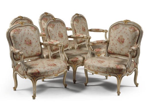 A SET OF SIX AUSTRIAN PARCEL-GILT AND WHITE-PAINTED FAUTEUILS