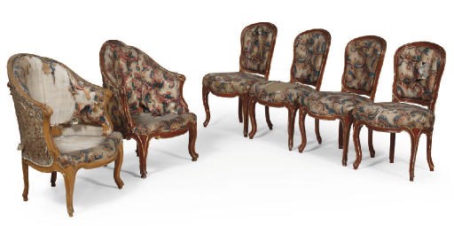 A SET OF FOUR AUSTRIAN PARCEL-GILT AND GRAINED SIDE CHAIRS