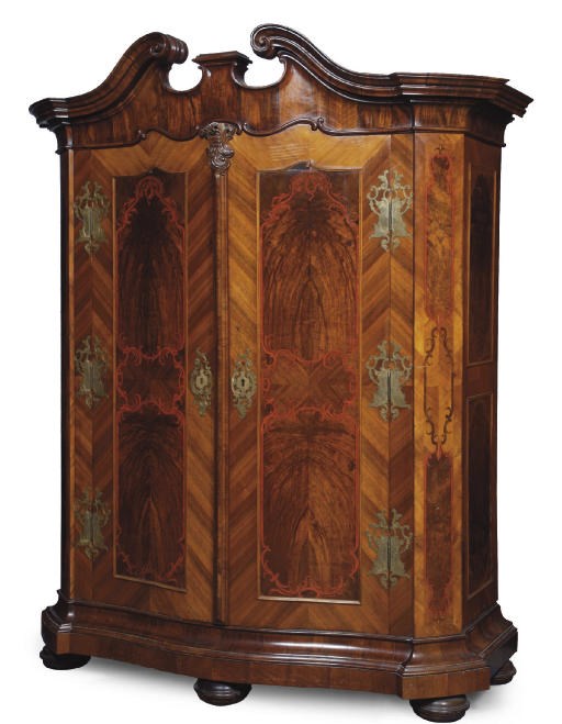 AN AUSTRIAN BRASS-MOUNTED WALNUT, FIGURED-WALNUT, PADOUK AND GRAINED CUPBOARD