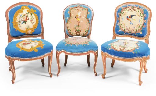 AN AUSTRIAN MATCHED SET OF PARCEL-GILT, FAUX-BOIX (LASUR) DECORATED AND BROWN-PAINTED SUITE OF SEAT FURNITURE