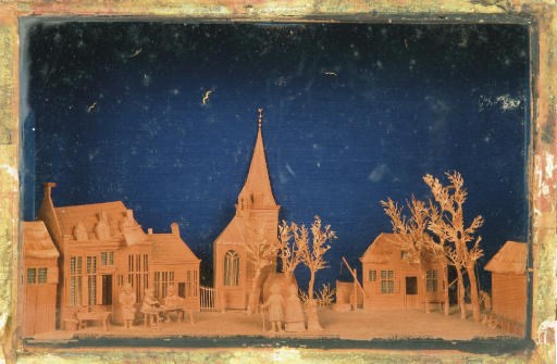A DUTCH CARVED WOOD AND CUT PAPER DIORAMA 'BAVELAAR'