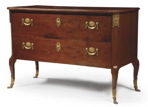 AN AUSTRIAN ORMOLU-MOUNTED MAHOGANY COMMODE