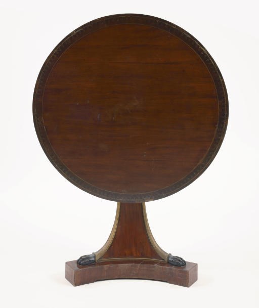 AN AUSTRIAN PARCEL-GILT, EBONIZED, MAHOGANY, STAINED FRUITWOOD, CHERRYWOOD AND BRASS-INLAID TILT-TOP CENTRE TABLE