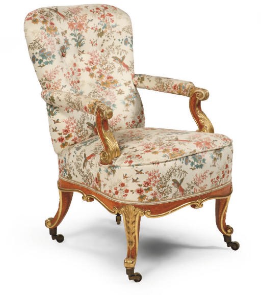 AN AUSTRIAN PARCEL-GILT GRAINED ARMCHAIR