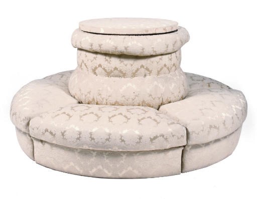 AN AUSTRIAN CIRCULAR SETTEE 'DIVAN DE MILIEU'