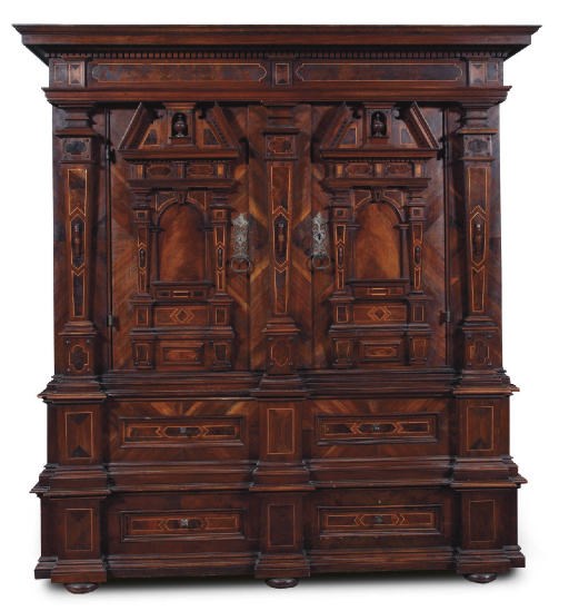 A SOUTH GERMAN WALNUT AND MAPLE CUPBOARD