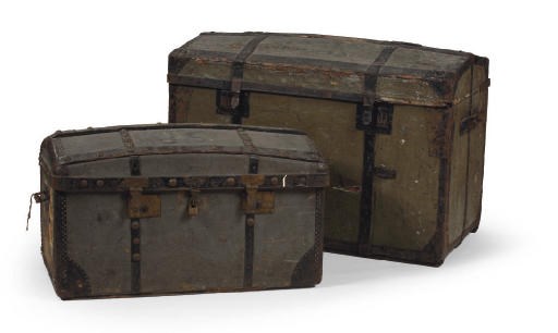 A BROWN LEATHER SUITCASE AND COVER