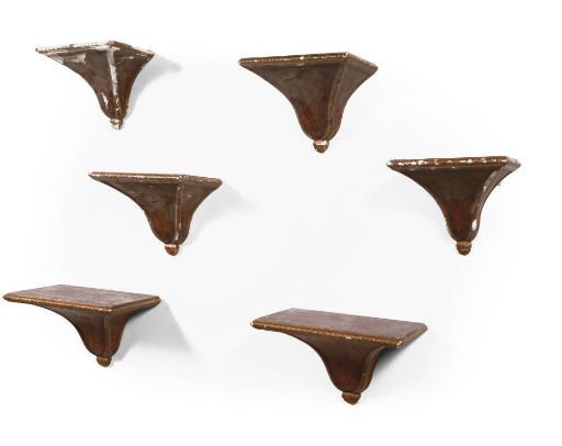 A MATCHED SET OF SIX PARCEL-GILT AND BURGUNDY-PAINTED PLASTER WALL BRACKETS