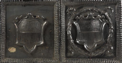 TWO AUSTRIAN BLACK-GLAZED EARTHENWARE TILES