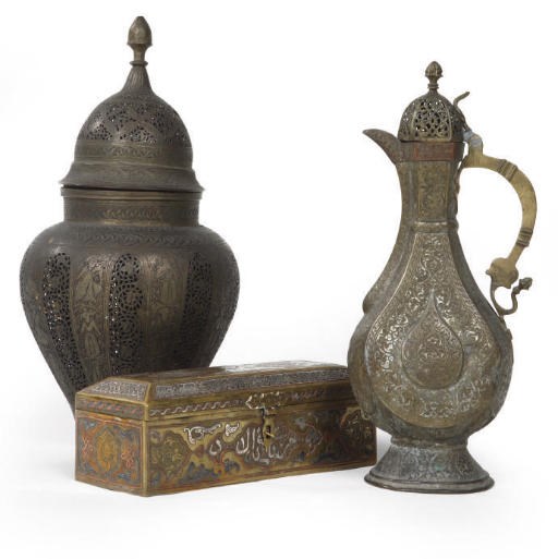 A QAJAR PIERCED AND ENGRAVED BRASS VASE