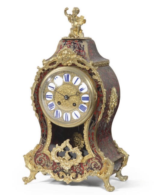 A FRENCH ORMOLU-MOUNTED TORTOISESHELL AND BOULLE MARQUETRY STRIKING CONSOLE CLOCK