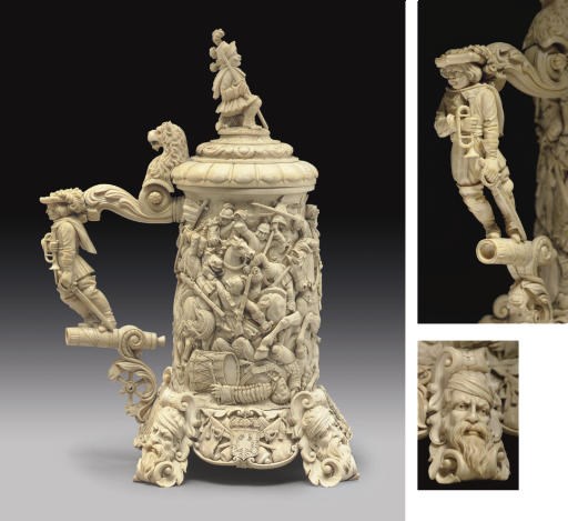 A FINE GERMAN CARVED IVORY TANKARD**