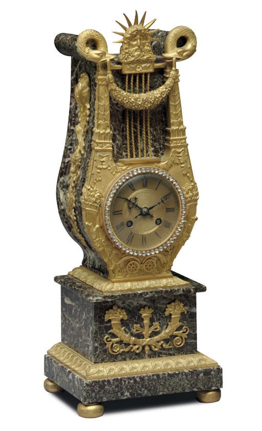 A FRENCH ORMOLU, MARBLE AND 'JEWELLED' MANTEL CLOCK