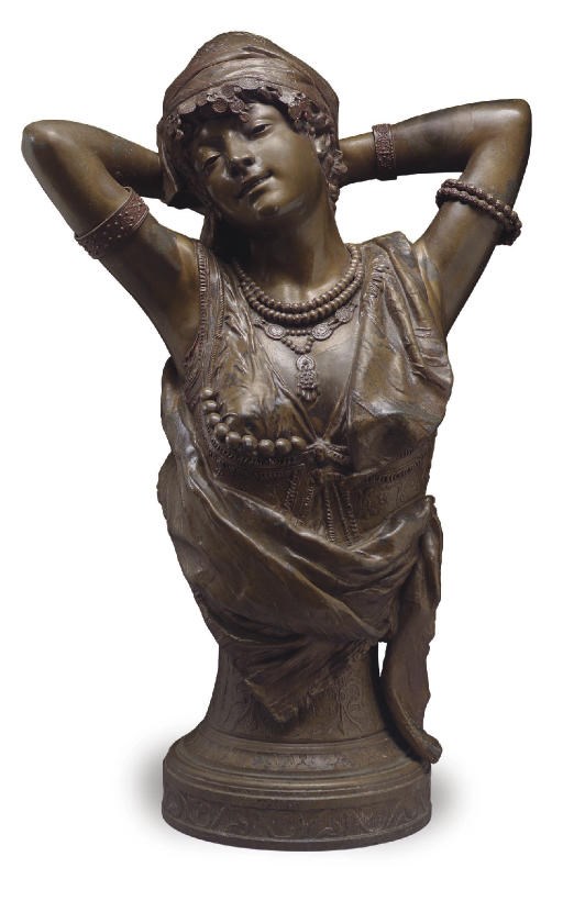 A FRENCH BRONZE-PATINATED SPELTER BUST OF A HAREM GIRL