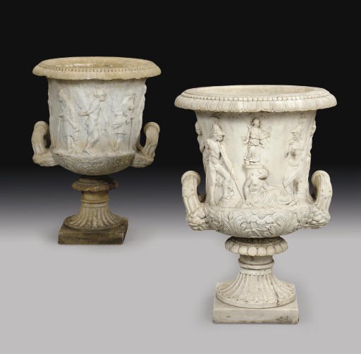 A pair of Italian marble copies of the Borghese and Medici vases