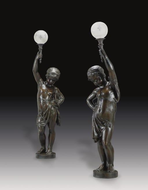 A PAIR OF FRENCH CAST-IRON FIGURAL TORCHERES