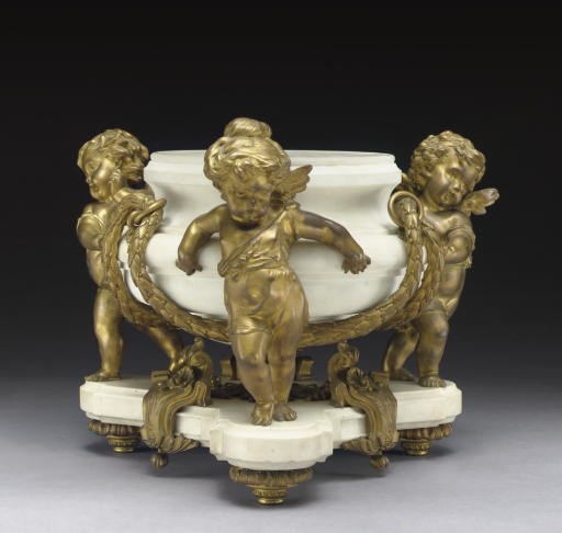 A FRENCH ORMOLU AND WHITE MARBLE JARDINIERE