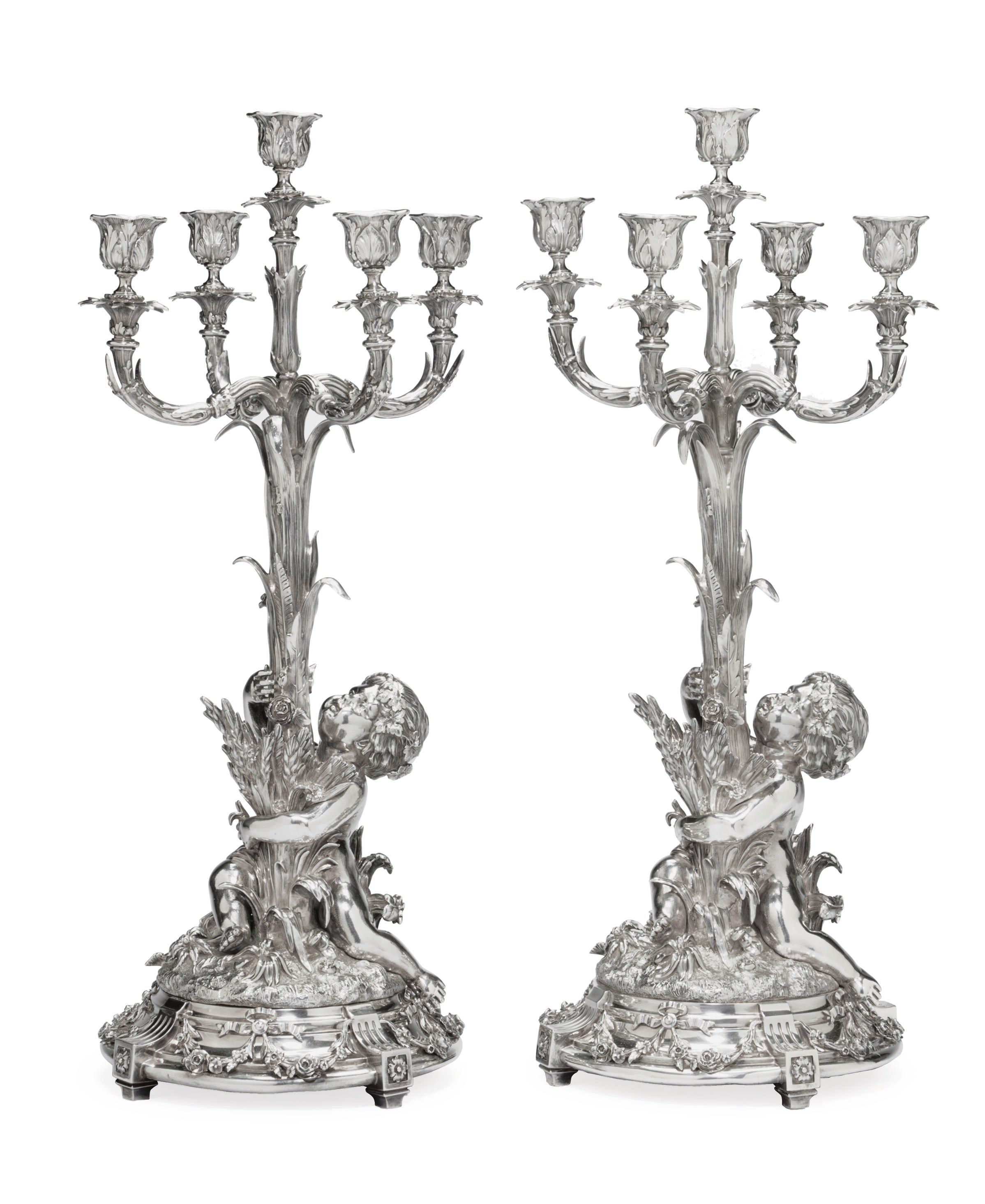 A Pair Of Silver Five-Light Candelabra
