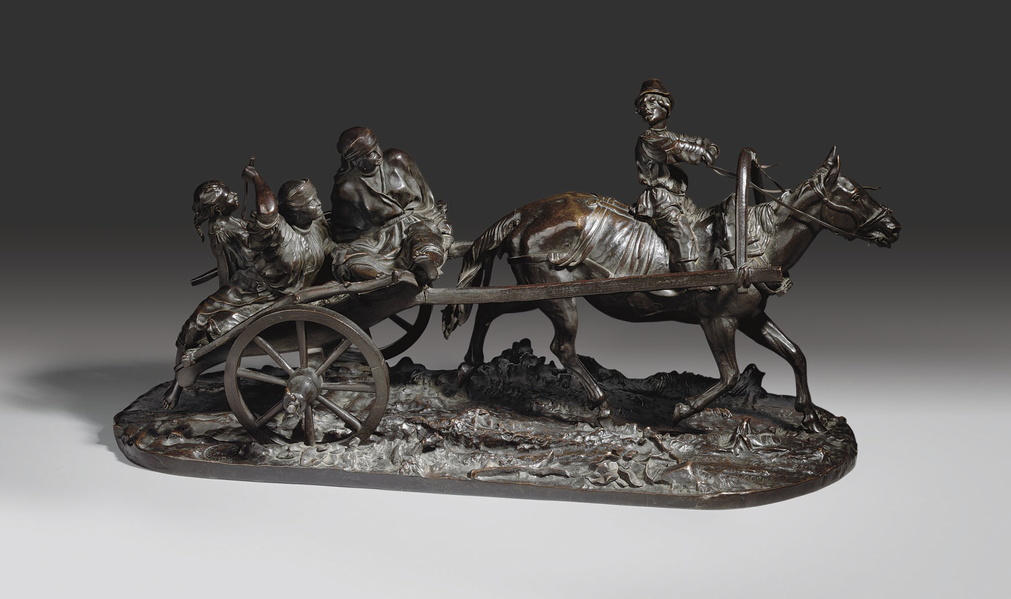 A Bronze Group of Peasants Riding to Market
