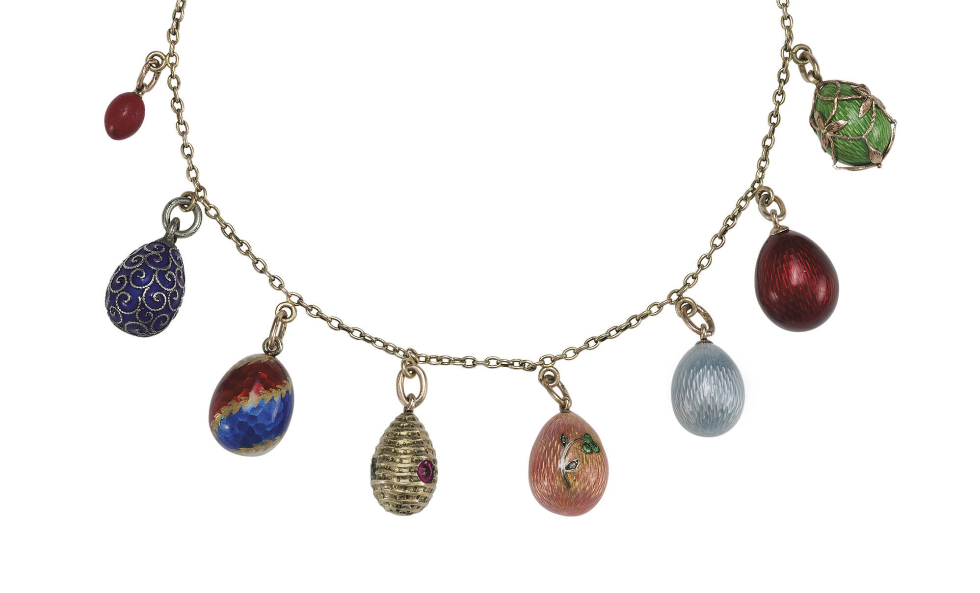 A Necklace of Eight Jeweled Gold, Guilloché Enamel and Purpurine Miniature Pendant Eggs