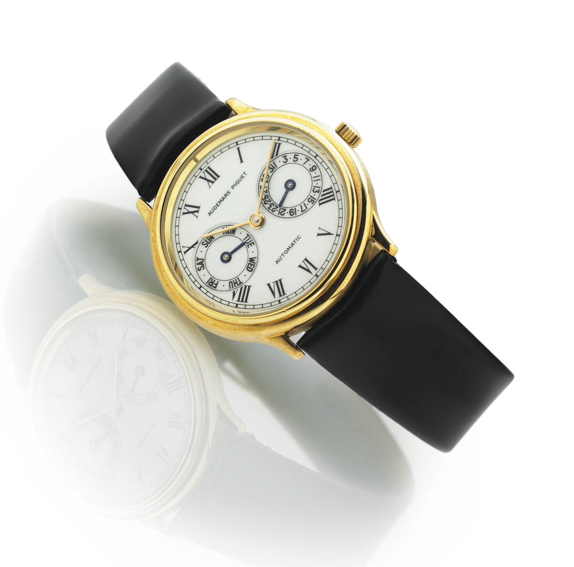 AUDEMARS PIGUET. AN 18K GOLD AUTOMATIC WRISTWATCH WITH DAY AND DATE