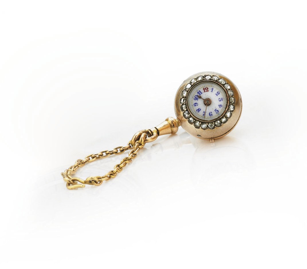SWISS.  AN 18K GOLD AND DIAMOND BALL-FORM KEYLESS CYLINDER WATCH