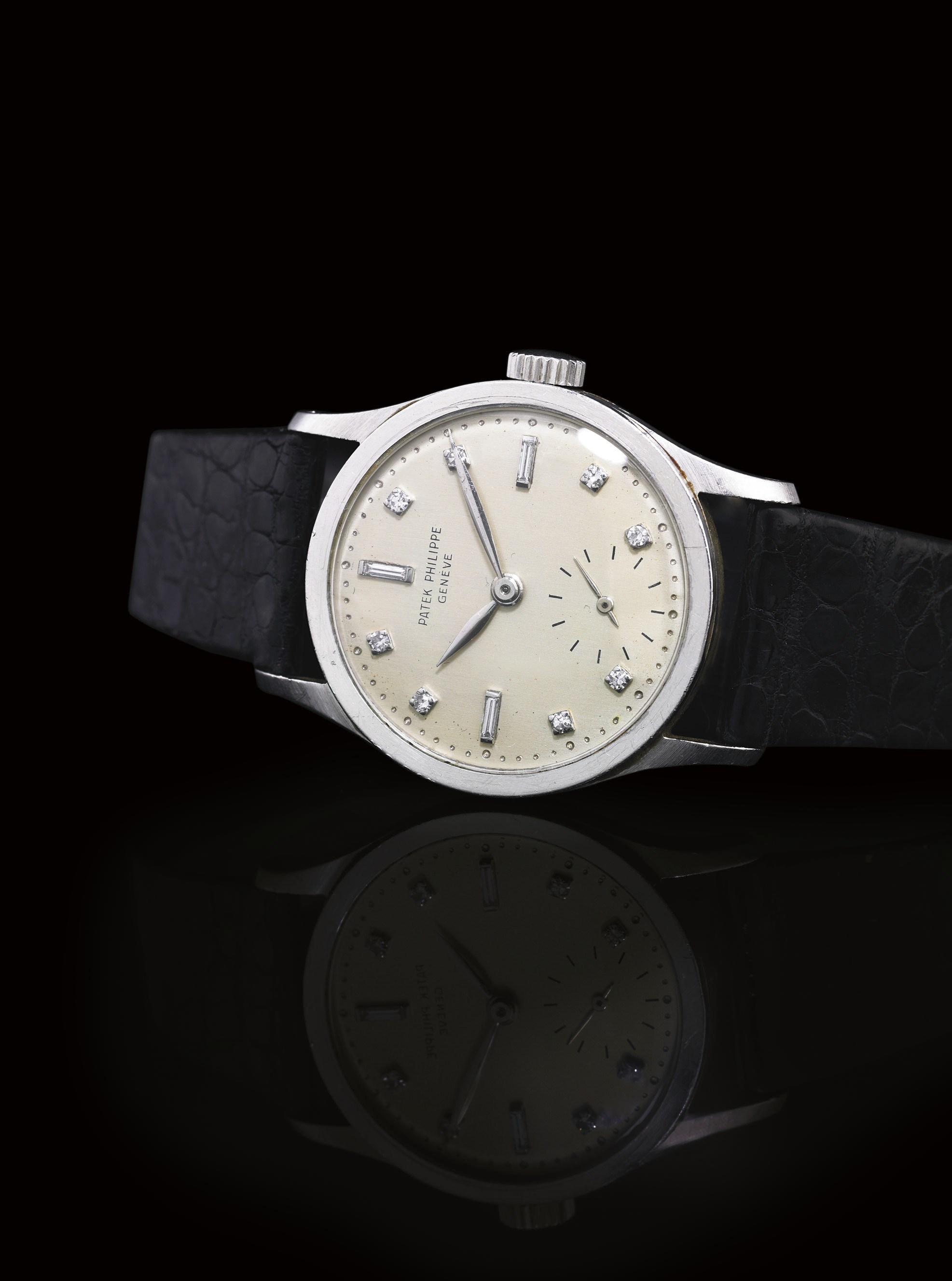 PATEK PHILIPPE. A RARE PLATINUM AND DIAMOND WRISTWATCH