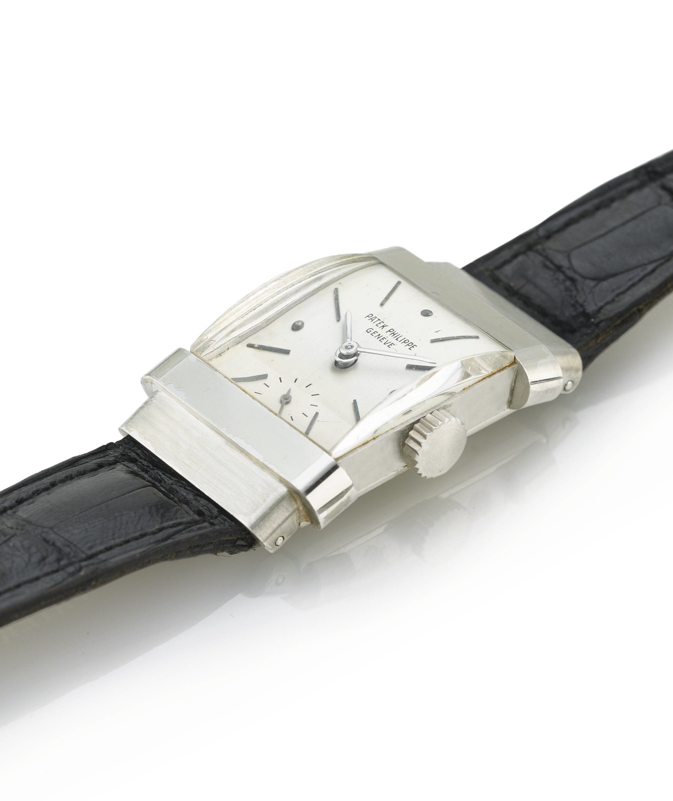 PATEK PHILIPPE. A FINE AND RARE PLATINUM RECTANGULAR WRISTWATCH WITH HOODED LUGS