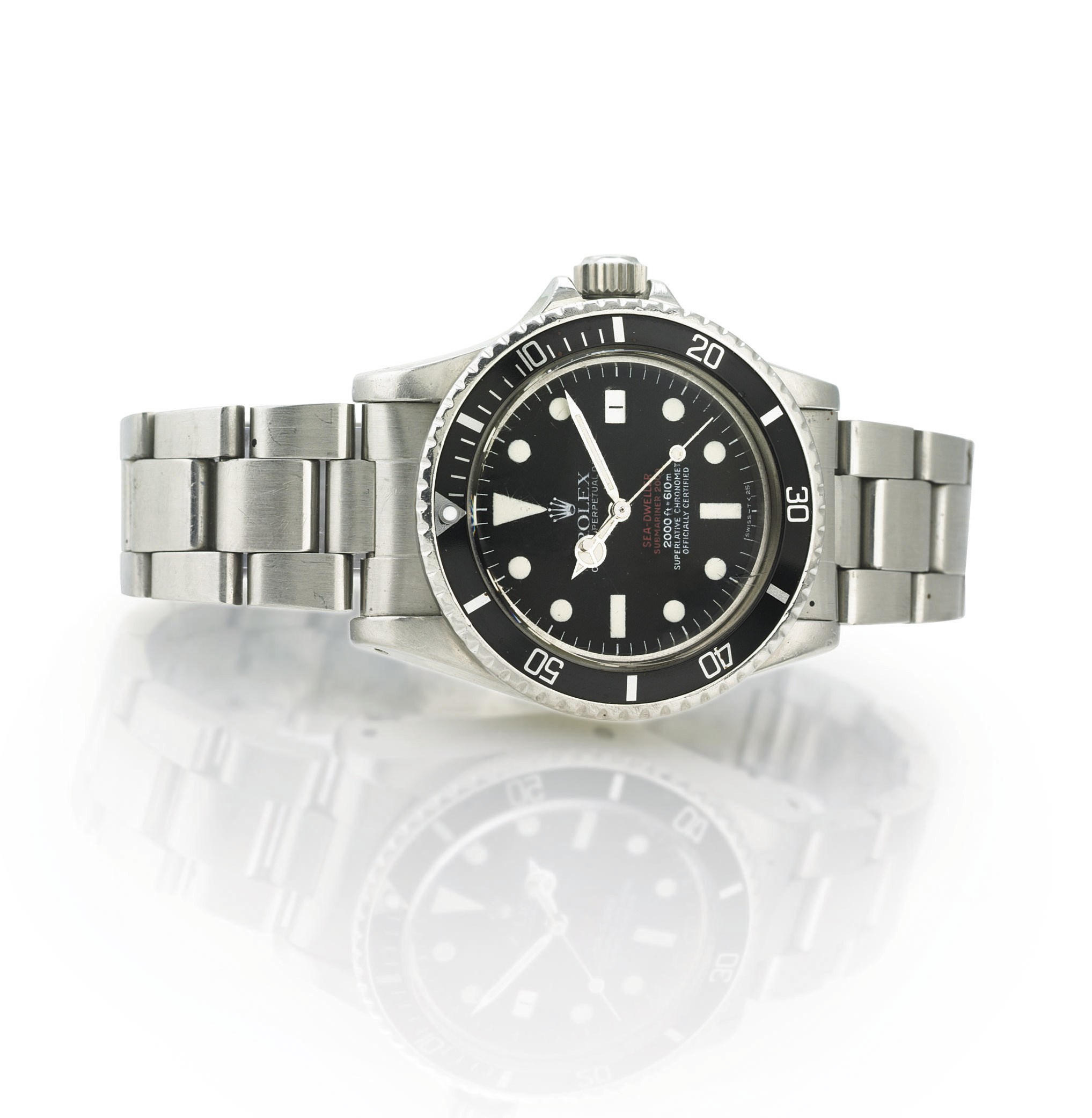 ROLEX. A FINE AND RARE STAINLESS STEEL AUTOMATIC WRISTWATCH WITH CENTER SECONDS, DATE AND BRACELET