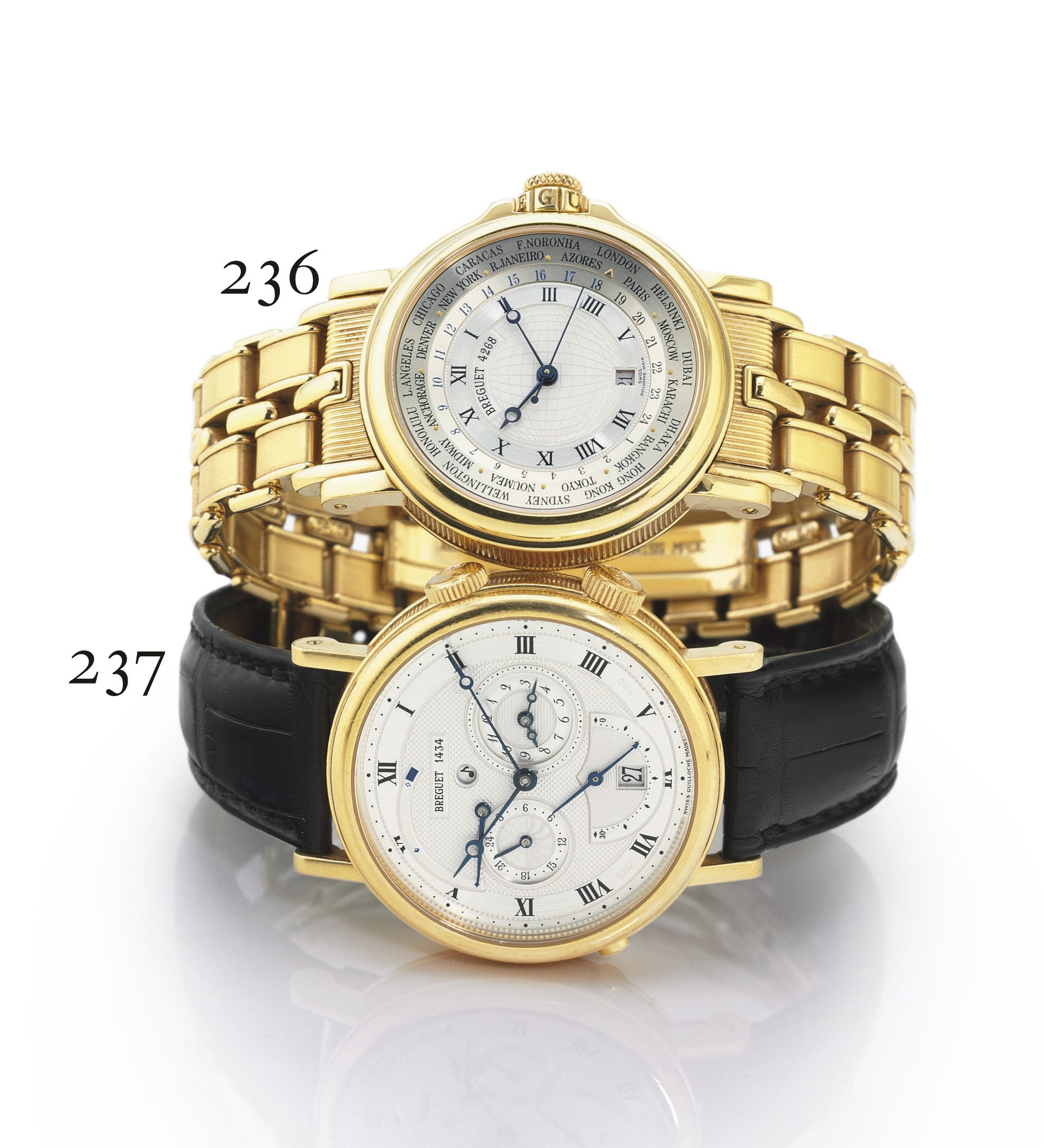 BREGUET. A LARGE 18K GOLD AUTOMATIC DUAL TIME WRISTWATCH WITH ALARM, DATE AND POWER RESERVE
