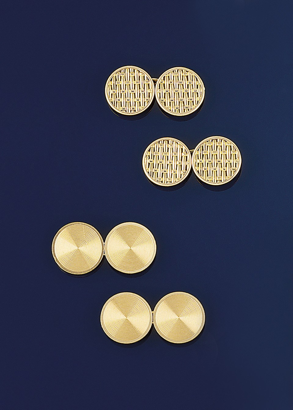 A pair of French cufflinks by Mellerio, and a pair of French Cufflinks