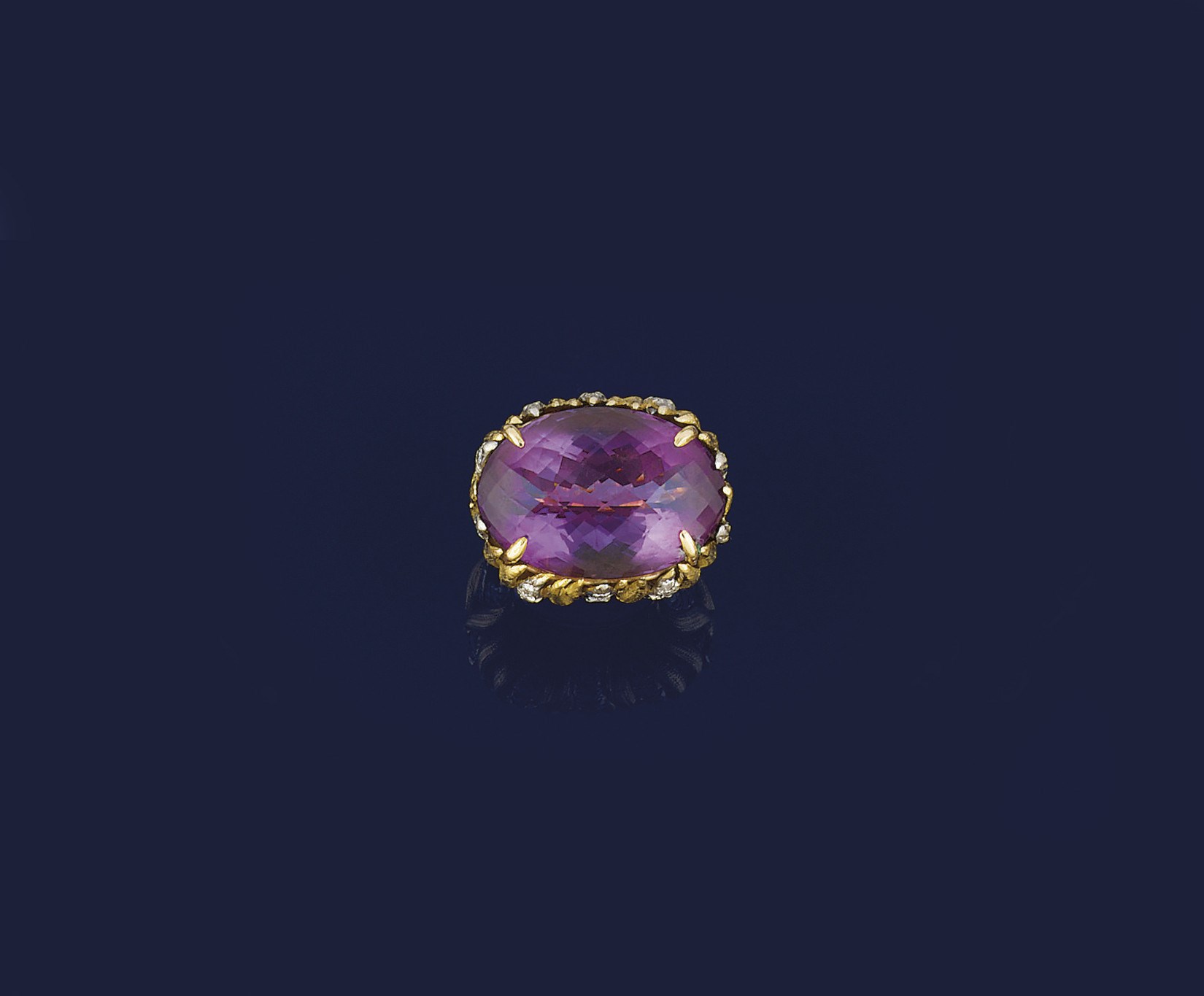 AN AMETHYST AND DIAMOND RING
