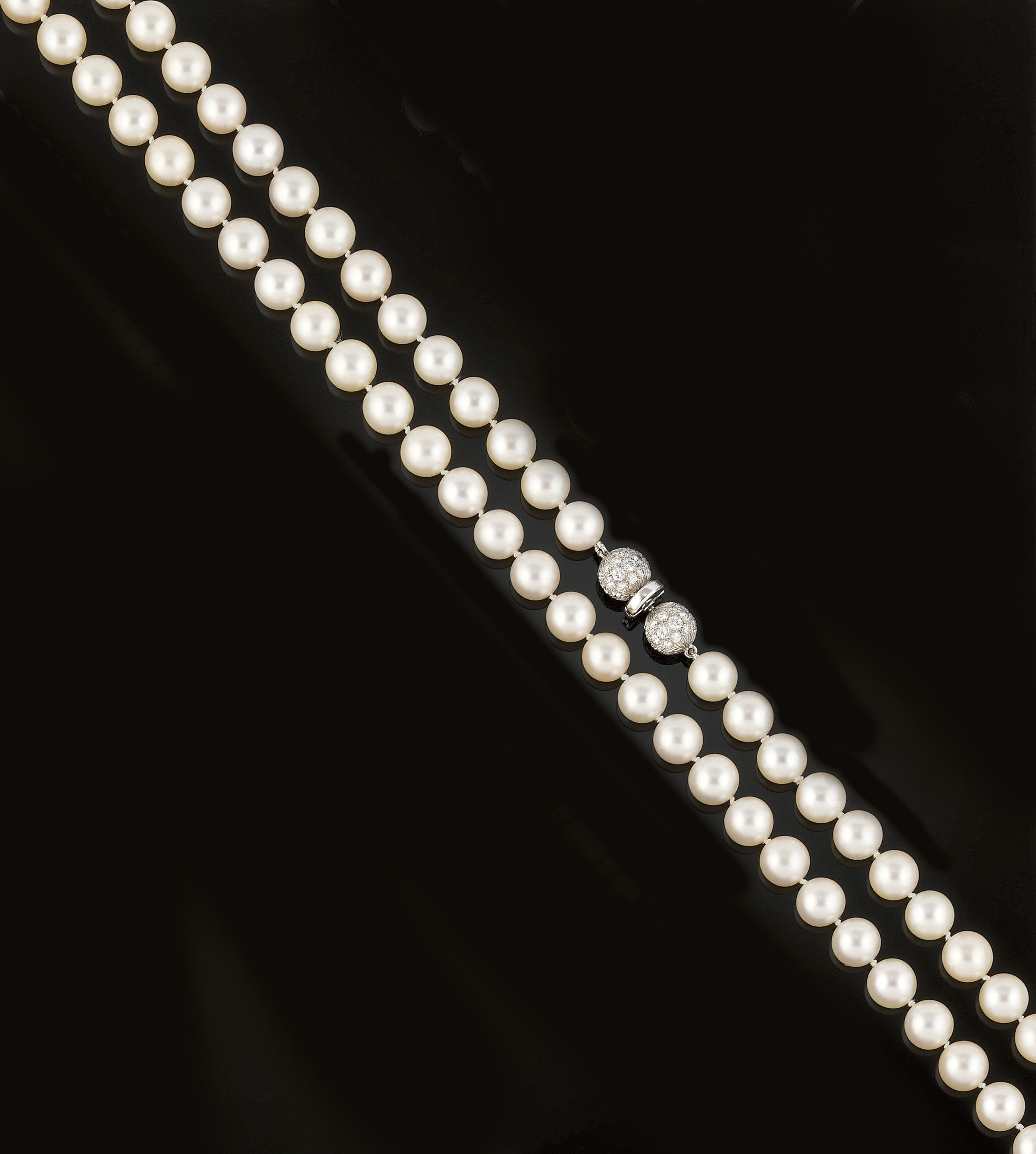A cultured pearl and diamond necklace