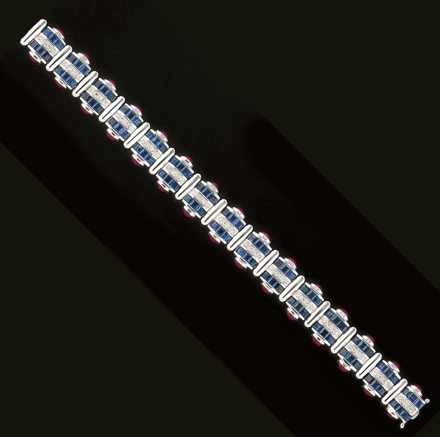 A diamond, sapphire and ruby bracelet